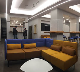 Modular colored sofa with a modern design for open space furniture, atrium, office entrance